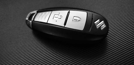 An Inside Look at Car and Truck Key Replacement Services in Port Charlotte FL - Key fob on textured surface