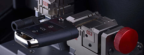 7 Benefits of Hiring a Professional Automotive Locksmith - image of a car key cutting machine.